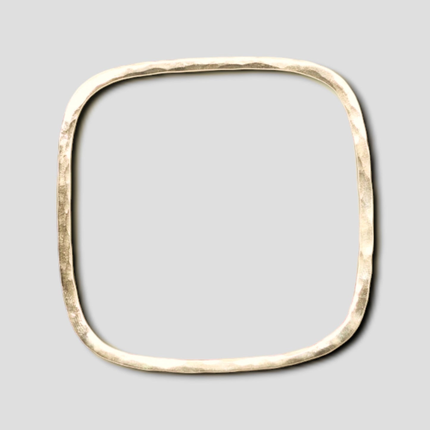 Gold statement bangle