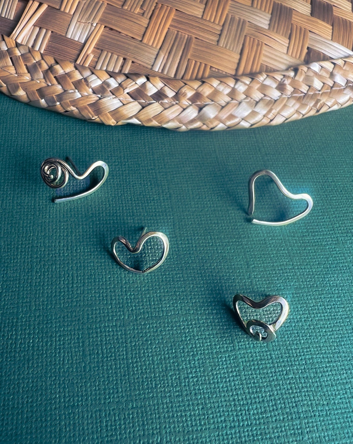 Handmade silver heart shaped studs