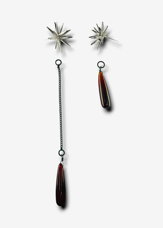 Sterling silver Beam stud earrings with detachable ruby quartz drop pendants and chain, laid out separately.