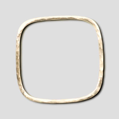 Gold statement bangle