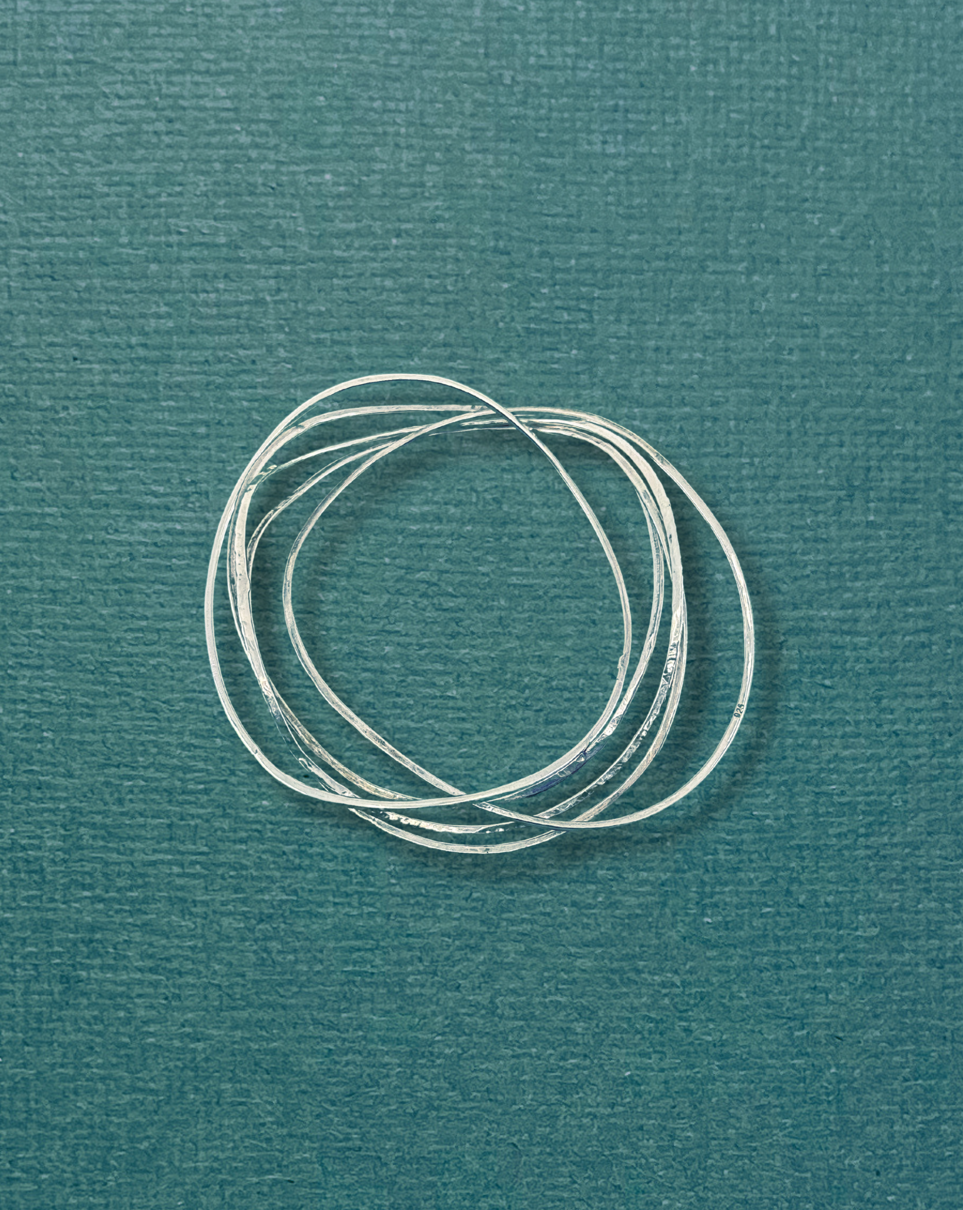 Wave shaped one of a  kind handmade silver bangles that hug your wrists perfectly